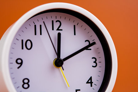 white alarm clock stop watch photoの写真素材