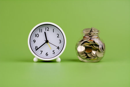 Savings in a glass bottle; savings; salary; income from work savings conceptの写真素材