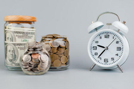 Coins and Time savings concept finance finance businessの写真素材