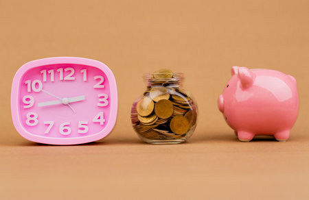 Saving coins in a glass jar Saving money for the future, investment savings, salary, income,...