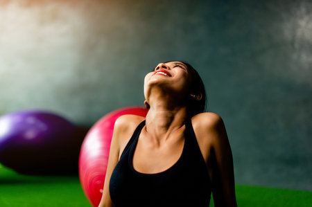 Exercise The joy of exercise. Happy young woman smiling from exercisingの写真素材