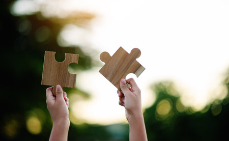 Jigsaw Puzzle Pieces Important Components Good work energy, connection, communication. and perfection, teamwork conceptの写真素材