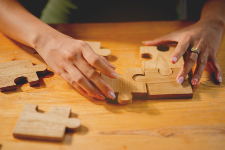 jigsaw, puzzle pieces, wooden jigsaw, unity, building blocks and teamwork Connection and...