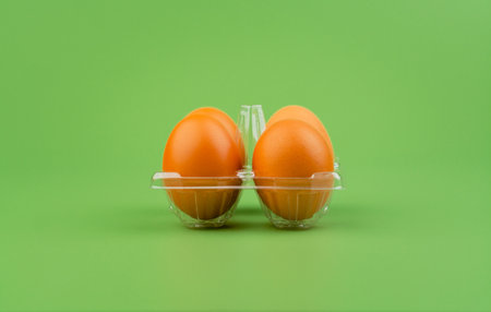 Chicken eggs arranged in egg casings. Brown eggs. Fresh breakfast eggs that are high in protein....