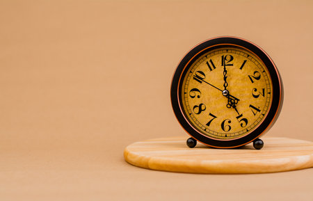 Brown vintage alarm clock Photo of a stationary clock, concept of time and how time works.の写真素材