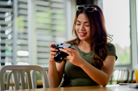 Beautiful Asian tourist and her personal camera female photographer Surround Milleles