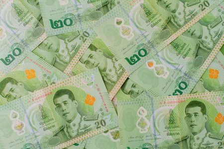 Thai money, Thai banknotes, cash flow, investing and financial planning and returns on stock investmentsの写真素材