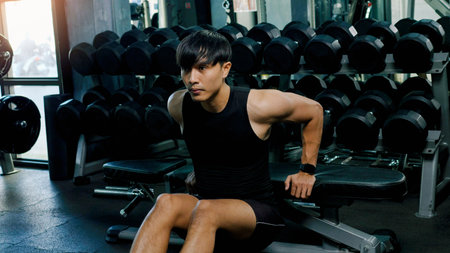 Exercise activities to build muscle for a healthy body, such as lifting weights with dumbbells and...