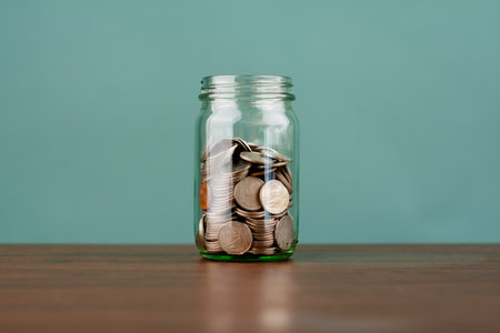 Saving Coins in Glass Bottle, Financial Planning and Financial Investment, Income from Work, Cash Flowの写真素材