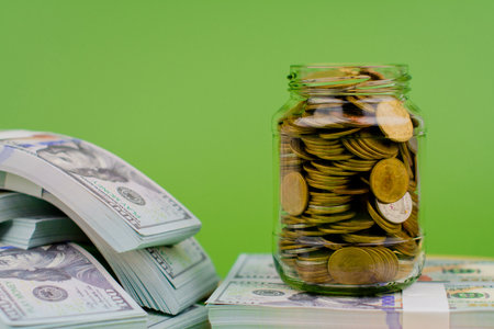 Saving coins, accumulating money for investment and a good future retirement
