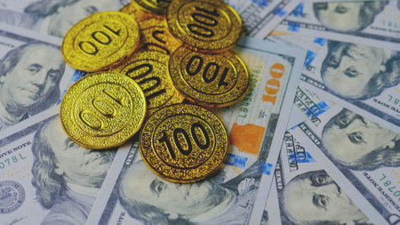 Dollar and gold symbols of financial success and wealth. Investment in currency and valuable assets.の写真素材