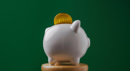 Saving gold in a piggy bank, planning finances and investments, goals and financial successの写真素材