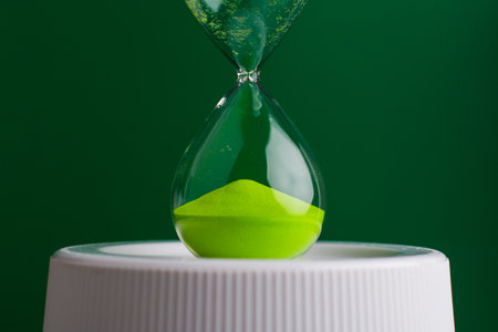 Hourglass The process of time running out The rule of limited timeの写真素材