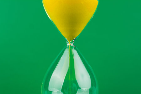 Hourglass The process of time running out The rule of limited timeの写真素材