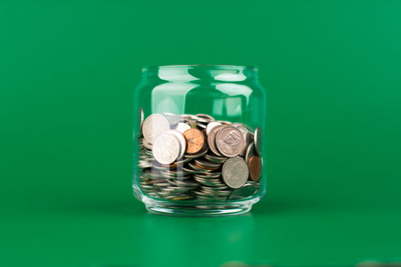 Saving Coins in Glass Bottles, Money, Financial Planning and Investment, Creating Financial Securityの写真素材