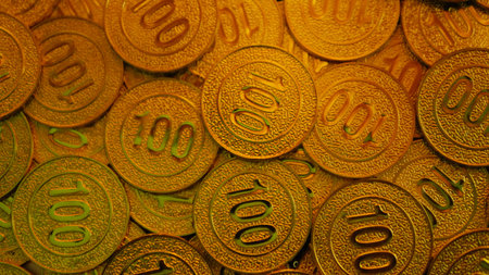 Gold coins and investment in the gold market, a tool to show wealth and financial stability.の写真素材