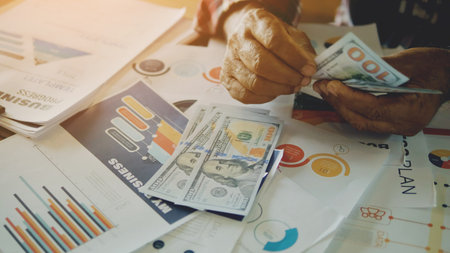 Dollar Currency, Banknotes and Financial Planning, Earning Money, Earning Income and Cash Flowの写真素材