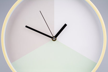 Clock tells the time of work and life. Time photography in studio. Concept of time and punctuality.