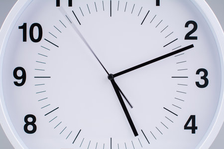 Clock tells the time of work and life. Time photography in studio. Concept of time and punctuality.