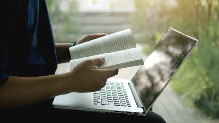 Reading at home and learning to concentrate and relax, improving skills from readingの写真素材