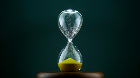 Hourglasses, stopwatches and working with time. The value of time and quality time management.の写真素材