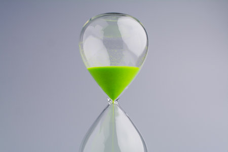 Green Hourglass and Effective Time Management Work and Life Photo Timer in Studio