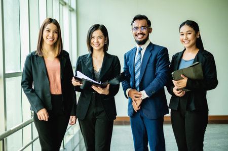 Happy teamwork among young entrepreneurs, teamwork, corporate growth goals and success in work.