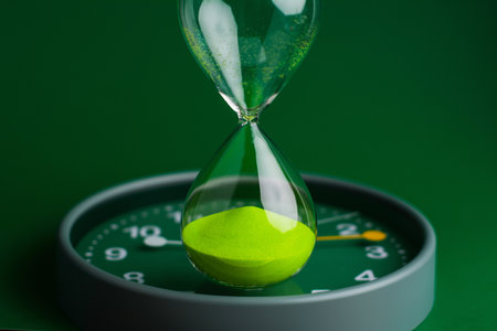Hourglass for timing work and life. Concept of time and quality time management. High quality studio shot.の写真素材