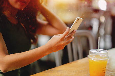 Online communication via smartphones, social media and networking, online shopping and banking transactions.の写真素材