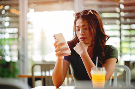 Online communication via smartphones, social media and networking, online shopping and banking transactions.の写真素材