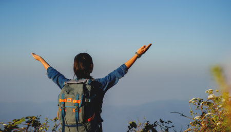 A free hand in life and letting go of life, optimism and happiness, a warm and sincere smile.の写真素材