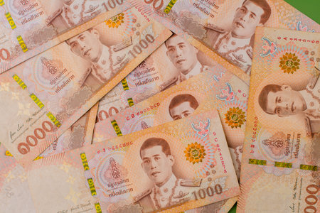 Thai currency, photos of money, saving money, building financial security, good financial planning, and setting financial goals and investments.の写真素材