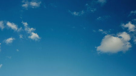 Cloud and sky view from above, and changes in daytime weather patterns.の写真素材