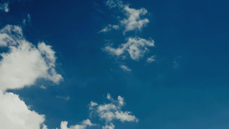 Cloud and sky view from above, and changes in daytime weather patterns.の写真素材