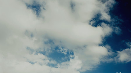 Cloud and sky view from above, and changes in daytime weather patterns.の写真素材