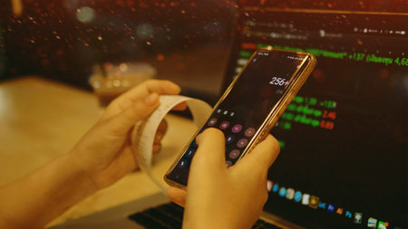 Financial billing and monthly income and expense calculations on your smartphone.の写真素材