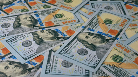 Dollar currency and financial investments, income from work and cash flow, financial success goals.の写真素材