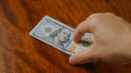 Dollar currency and financial investments, income from work and cash flow, financial success goals.の写真素材