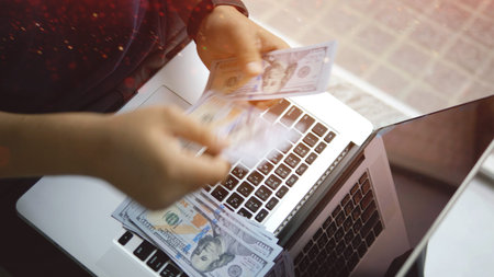 Dollar currency and financial investments, income from work and cash flow, financial success goals.の写真素材