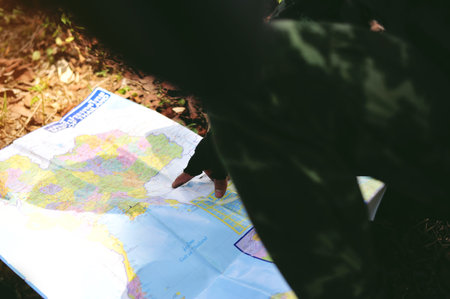 The use of jungle maps for surveying, terrain exploration, and navigation.の写真素材