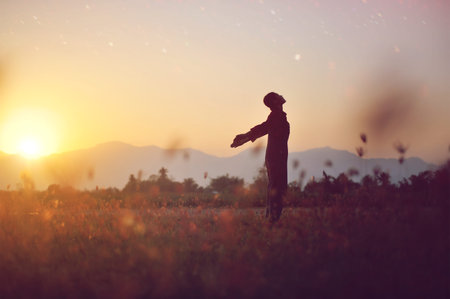 Silhouettes represent victory and success in work, a free and relaxed life in harmony with nature.の写真素材