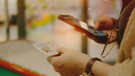 Buying lottery tickets and investing in lotteries involves the risk of winning and gambling.の写真素材