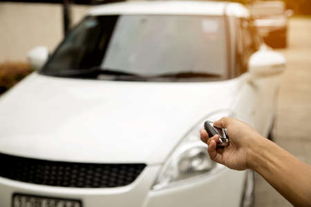 Hand press remote car.Concept finance.Car business concept.の写真素材