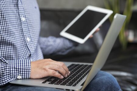 Business man is working at home.Concept of work from home, technology.の写真素材