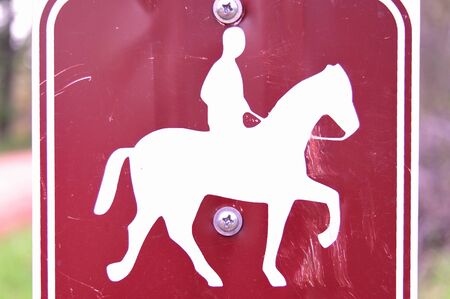 Red Horse Trail Riding Sign - Close-upの写真素材