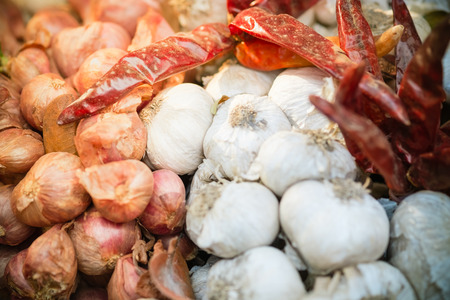 Thai herbs,Garlics,Red onions and Chilli using as advertorial,wallpaper,postcard or backgroundの写真素材