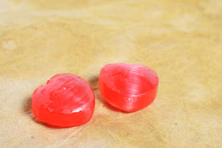 Heart candy on brown paper background