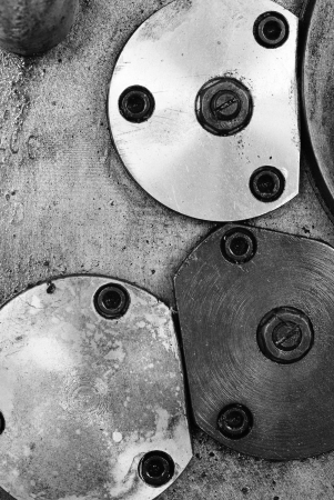 Locked plate onthe old lathe machine on black and white background