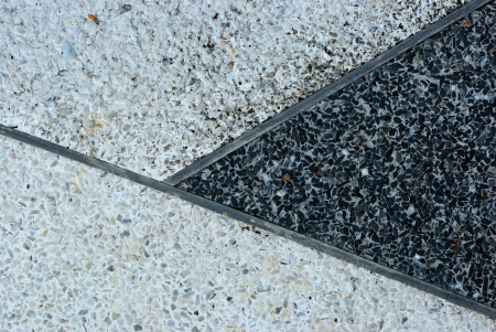 Abstract old terrazzo floor with black and grey backgroundの写真素材