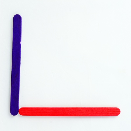 Colorful wood bar separated to L consonant on isolated whiteの写真素材